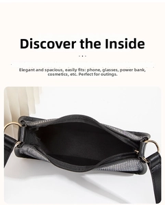 Top view of rhinestone shell makeup bag showing interior storage for phone and cosmetics