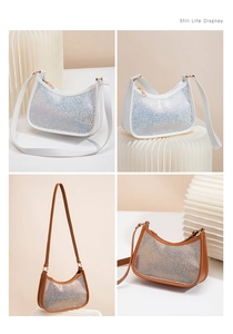 Detail view of sparkly sequin armpit bags in white and brown with gold hardware