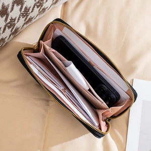 Women's long quilted black leather wallet with pink interior and large capacity