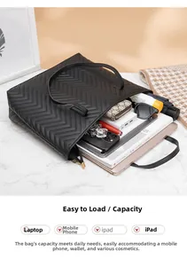 Vue intérieure du grand cabas noir matelassé pouvant contenir un ordinateur 14 pouces et du maquillage