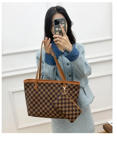 Detail of checkered tote bag set with matching pouch and circular logo print