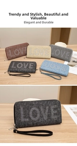 Detail of multi-color fabric zip-around wallets with crystal LOVE lettering and wristlet