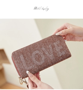 Brown denim texture zip wallet featuring sparkling rhinestone LOVE lettering and wrist strap