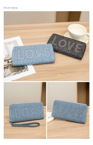 Detail of denim texture wallets with sparkling rhinestone LOVE lettering and secure zip