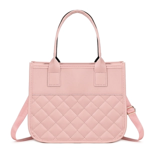 Pink quilted tote bag for women with dual handles and adjustable shoulder strap
