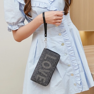 Dark grey denim wristlet bag with silver rhinestone LOVE letters and black strap
