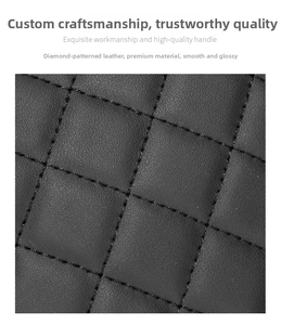 Gros plan détaillé sur la texture en cuir noir matelassé et les coutures précises