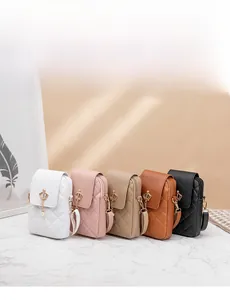 Detail of quilted mini crossbody bags in five colors with pearl crown charms