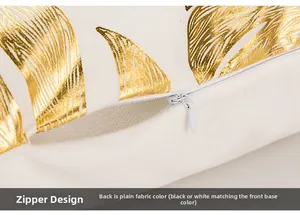 Detailed view of the invisible zipper design on a white gold leaf pattern pillow cover