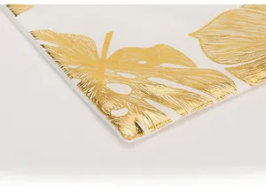 Detail of gold leaf pattern with digital printing on a white sofa cushion cover