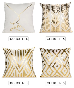 Set of four cushion covers with gold foil geometric patterns and Love typography detail