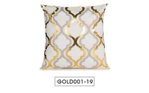 Detail of white pillowcase with gold and grey Moroccan trellis pattern and foil print