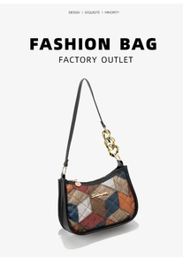 Close-up of multi-texture patchwork shoulder bag with gold chain and logo plate