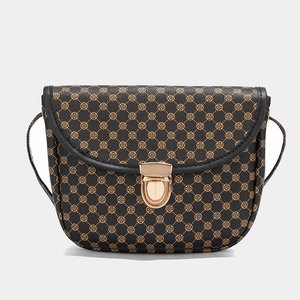 Sac bandoulière vintage matelassé avec motif trèfle et boucle dorée sur fond gris
