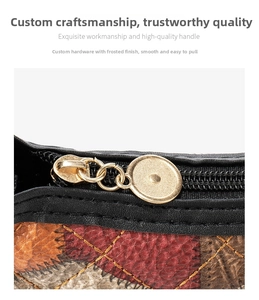 Macro shot of gold metal zipper and diamond quilted leather texture on shoulder bag