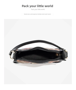 Detail view of the bohemian pattern bag with golden zipper and black fabric lining