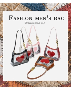 Macro shot of stylish heart logo PVC crossbody bags in multiple colors with gold chains