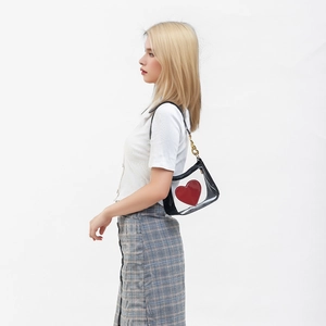 Minimalist PVC clear crossbody bag for women featuring a red heart logo and black trim