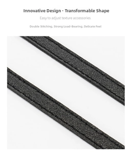 Detail of high-quality black faux leather bag strap with durable double-stitched edges