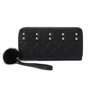 Women's long quilted wallet with gold studs, faux fur pompom, and wristlet strap