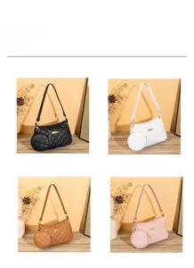 Borsa baguette trapuntata nei colori nero bianco marrone e rosa con borsellino