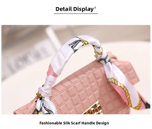Detailed shot of pink checkered embossed handbag featuring a stylish silk scarf handle