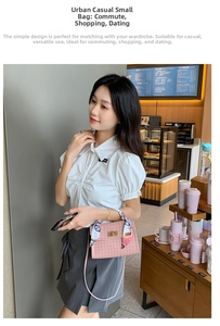 Pink lattice embossed handbag with silk scarf detail and golden lock shown in cafe setting