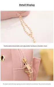 Detail of pink quilted crossbody bag with adjustable gold chain strap and durable zipper