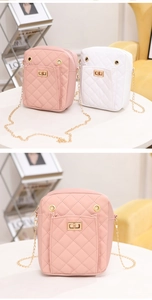 Detail of quilted mini crossbody bag with gold metal twist lock and chain strap
