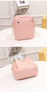 Detailed front and back view of pink quilted leather crossbody bag with chain strap