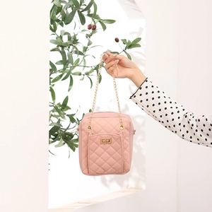 Pink quilted mini square bag with chain strap and gold twist lock closure for women