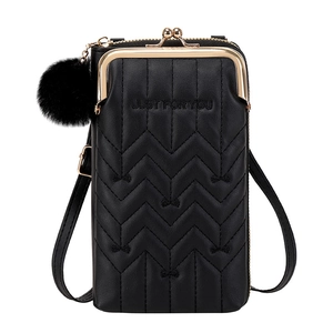 Black quilted crossbody phone bag with gold metal clasp and fluffy ball charm detail