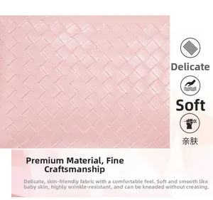 Macro shot of pink woven leather texture with high wrinkle resistance and soft finish