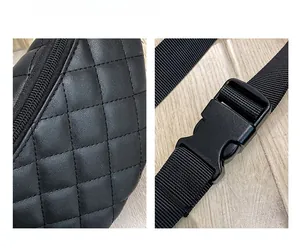 Detail of black quilted waist bag showing fine stitching, metal zipper and buckle strap
