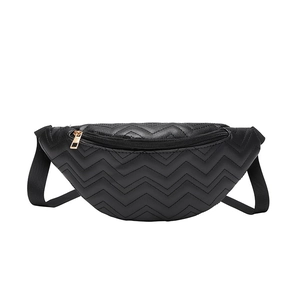 Quilted black waist bag with V-shaped stitching and golden zipper on white background