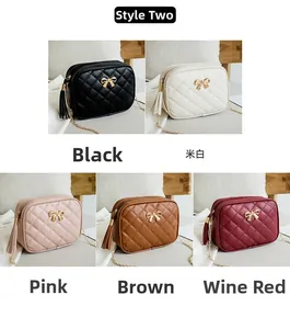 Close-up of quilted mini crossbody bags with gold bow accents and tassel charms in five colors