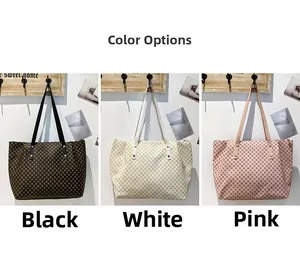 Detailed view of large tote bags in black, beige and pink with geometric patterns