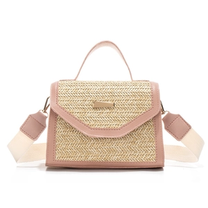 Pink and beige straw woven crossbody bag with gold metal buckle and wide shoulder strap