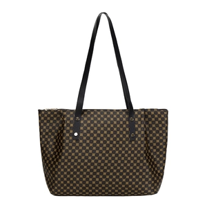 Deep brown large capacity tote bag with gold polka dot pattern and black handles