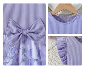Détail de robe violette pour fille avec corsage côtelé, nœud à la taille et jupe en tulle