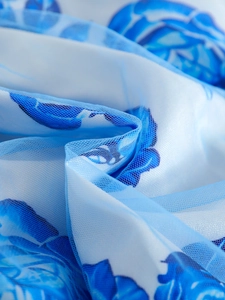 Girl's blue rose print pleated skirt with delicate white floral mesh overlay layer