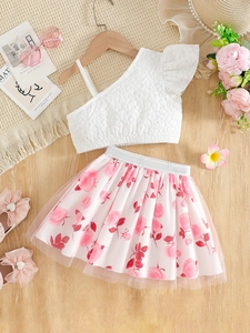 Girls summer two-piece outfit featuring white textured top and pink floral mesh skirt