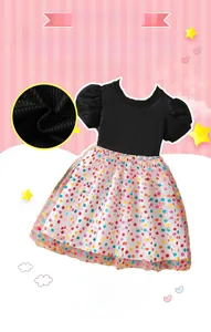 Detail of black ribbed knit bodice and puffy sleeves on a toddler polka dot mesh dress