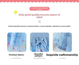 Detail of girl's blue mesh dress featuring colorful butterfly prints and knit bow