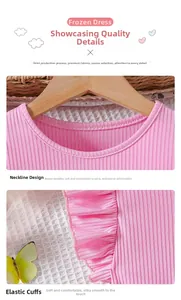 Detail of pink knitted girl's dress showing the ribbed texture, crew neck and ruffled cuffs