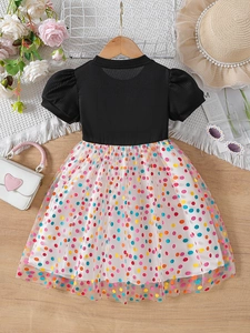Girls' summer puff sleeve dress with black bodice and colorful polka dot tulle skirt