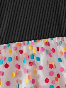 Girls black ribbed knit dress with colorful polka dot tulle mesh skirt details