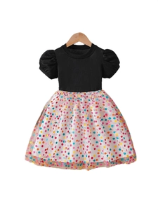Girls' summer dress featuring black ribbed knit top and colorful polka dot tutu skirt