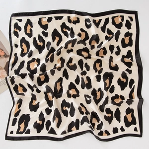 Classic leopard print silk-like square scarf with black border and magazine styling