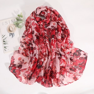Elegant pink floral scarf with red rose print made of soft breathable lightweight fabric